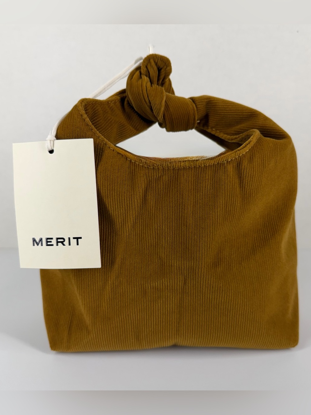 MERIT Beauty The Signature Bag Brown Camel Corduroy Tie Top Knot Clutch Hobo